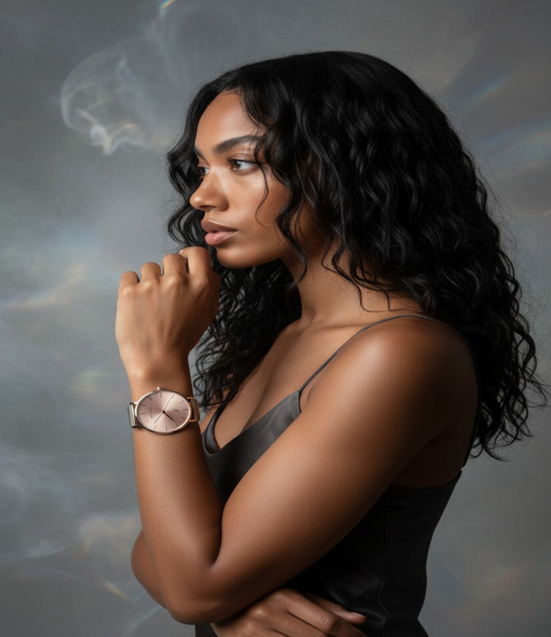 Woman wearing a gray slip dress with a advance blush quartz movement watch 36mm in blurred background