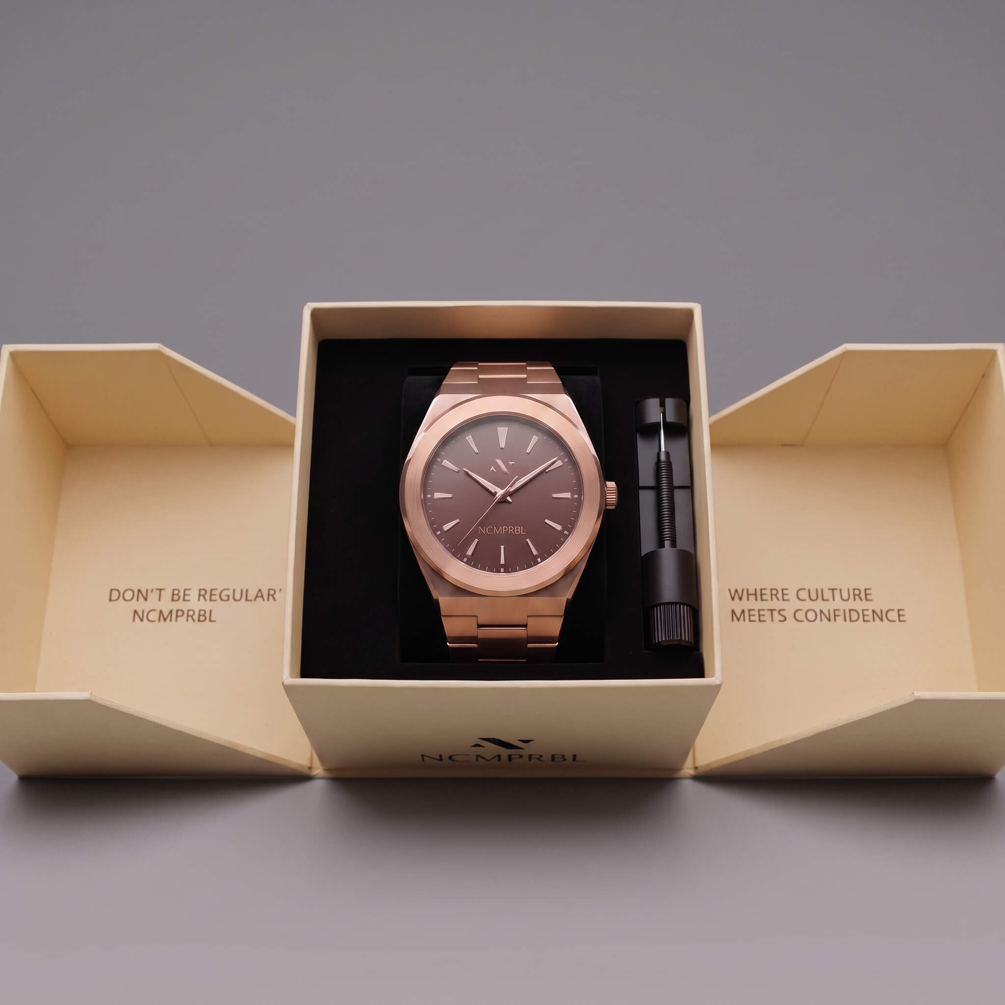 Elevate Link Mocha 42mm men's rose gold Swiss watch displayed in branded box