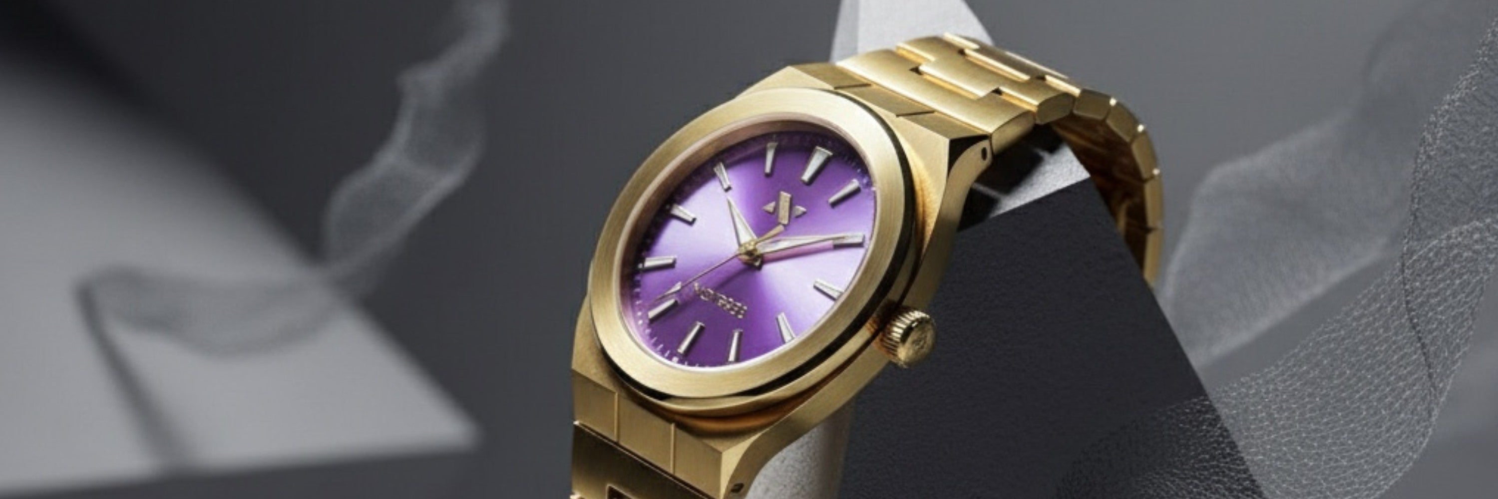 A curated display of NCMPRBL luxury watches and timepieces, highlighting brushed metal and ceramic constructions.