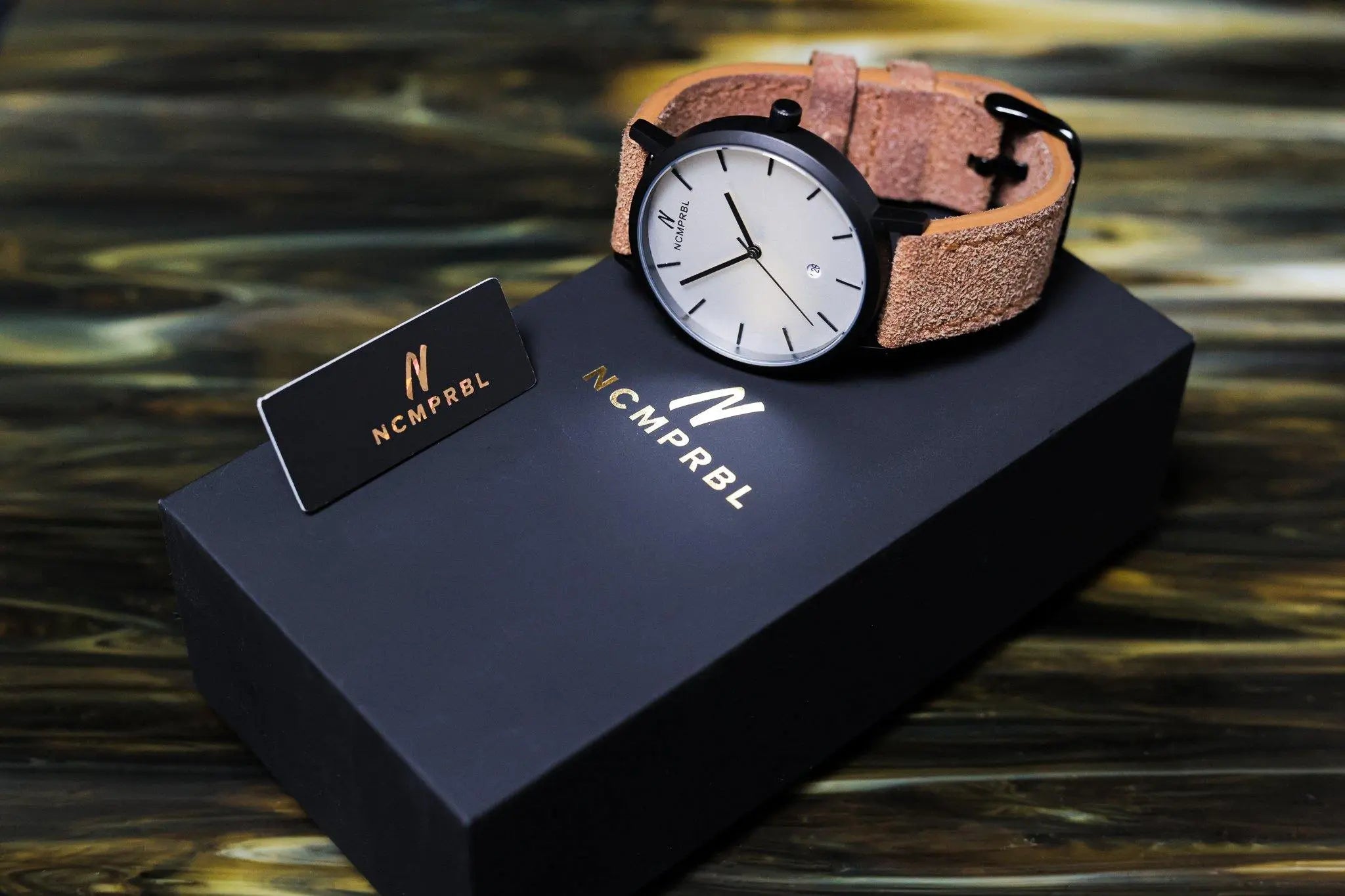 Originals Collection by NCMPRBL – a display of limited-production 40MM stainless steel watches with suede leather straps.