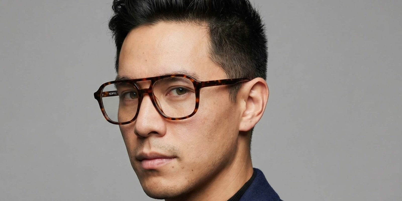 NCMPRBL Axis eyewear collection hero shot showcasing flat top acetate eyeglass frames.