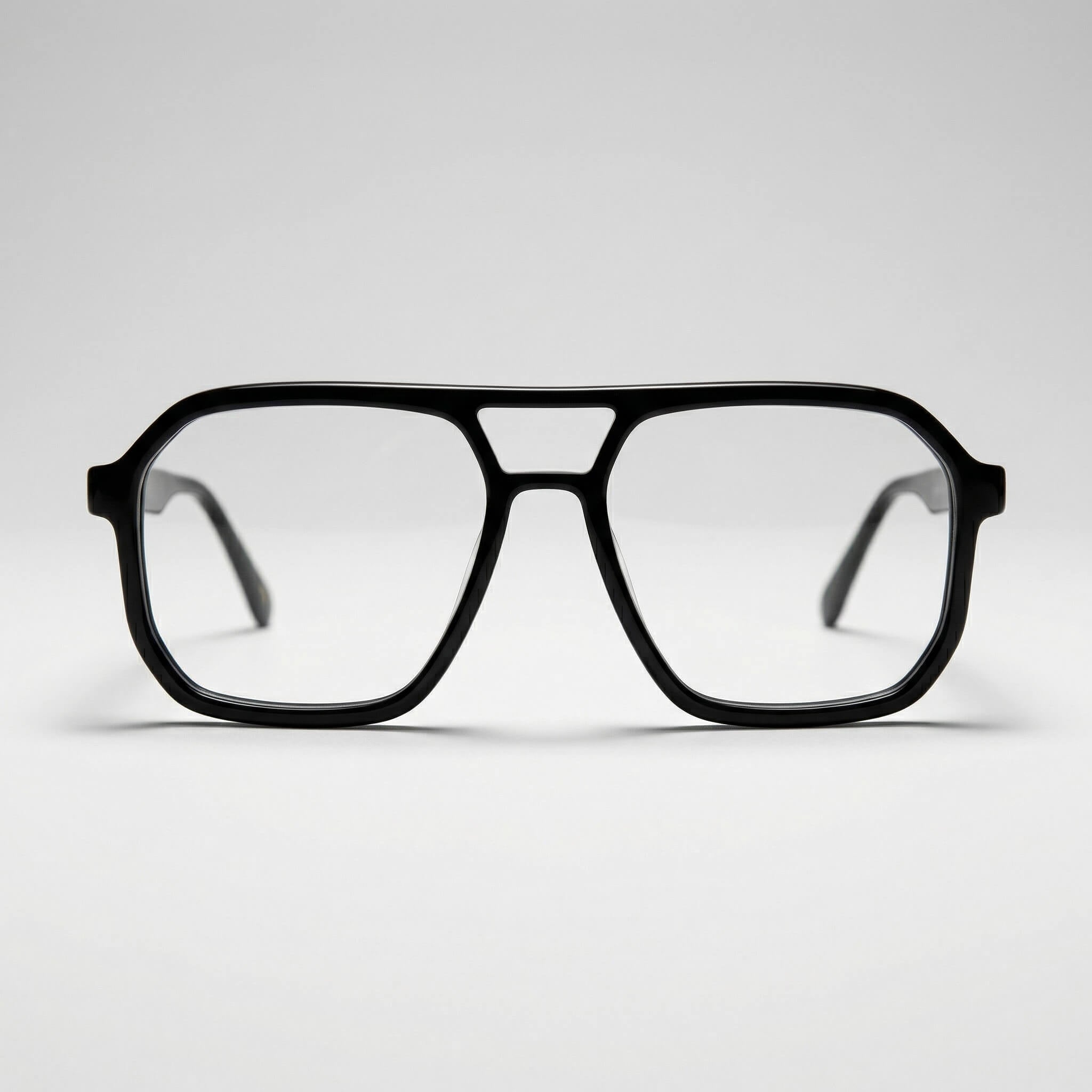 Black axis 01 onyx 53mm flat top aviator style eyeglasses with a double bridge and clear lenses, photographed from the front on a light gray studio background.