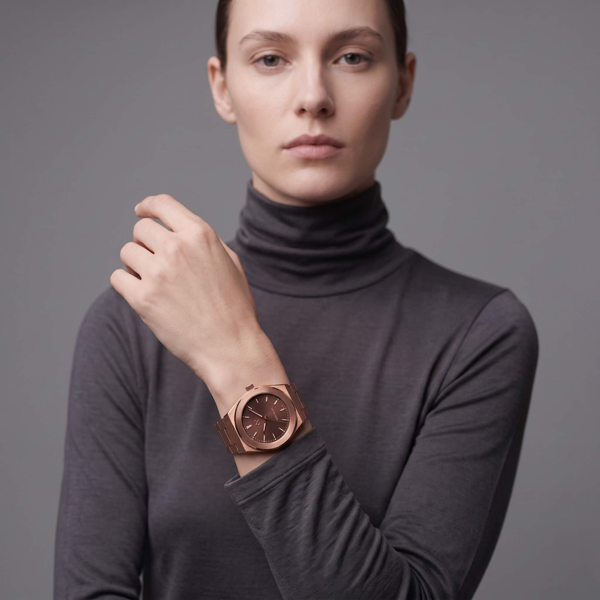 Front view of Elevate Link Mocha 42mm rose gold and brown Swiss watch worn
