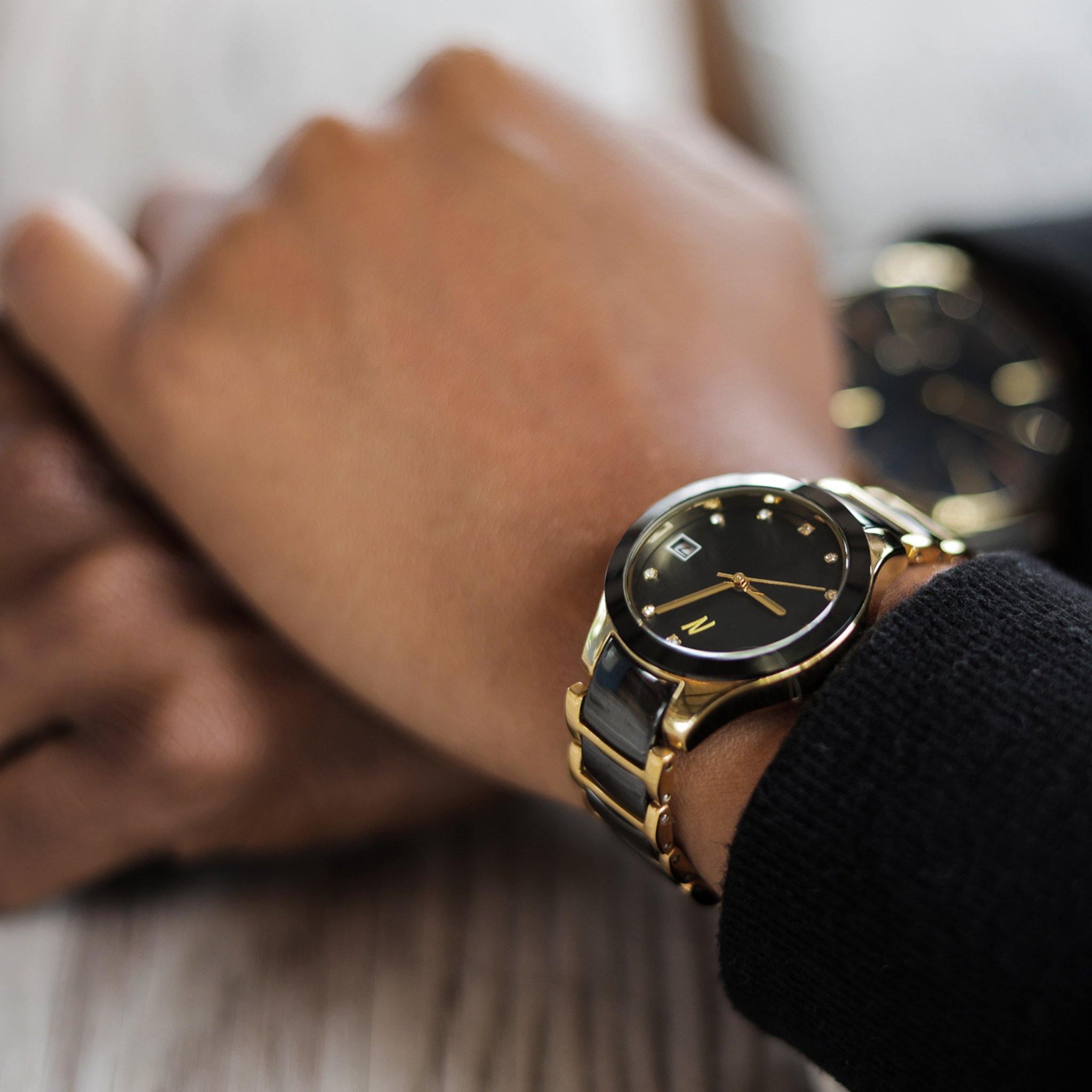 Quartz Petite Collection women's watch 34MM in black and gold ceramic bracelet style